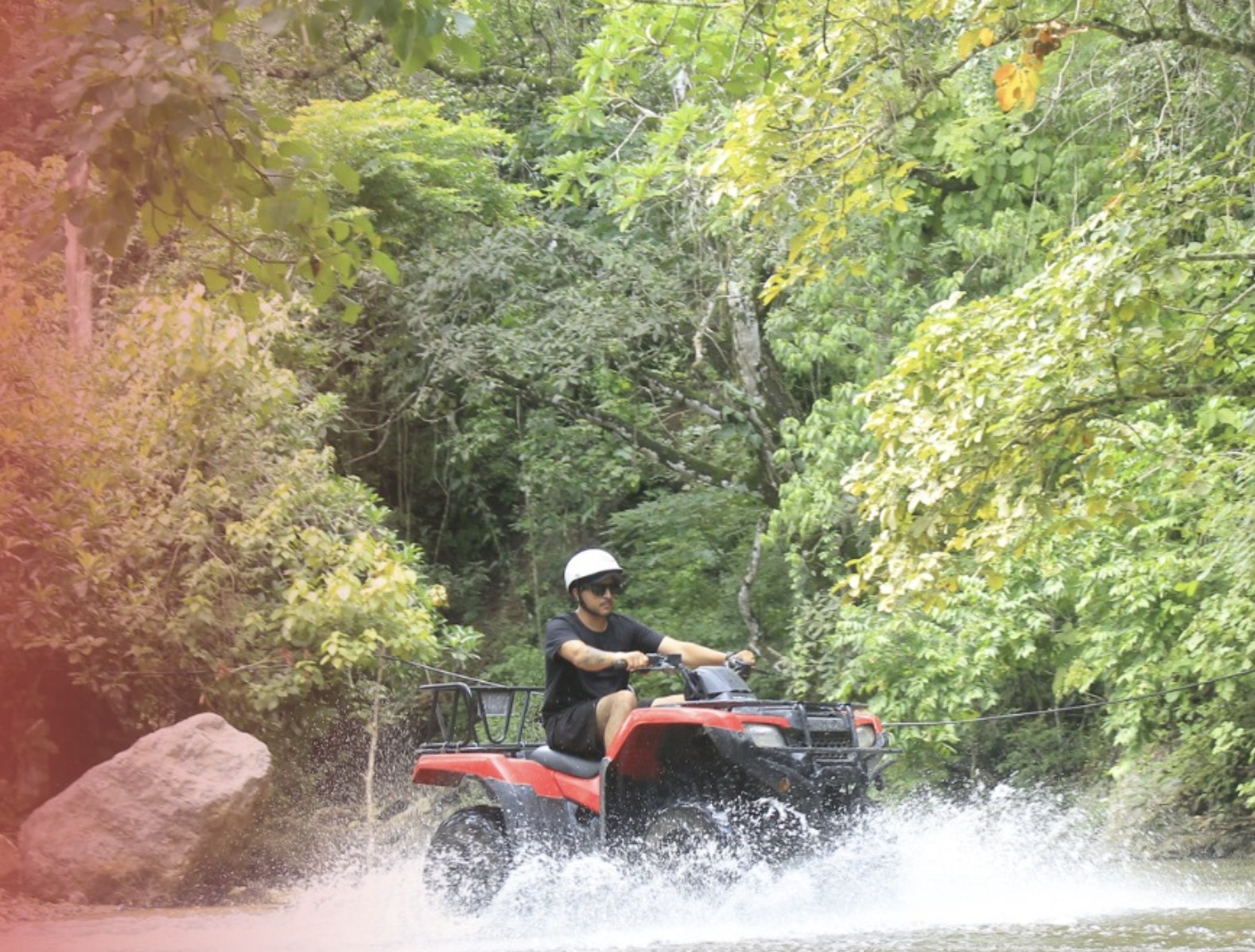ATV crossing the river